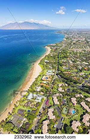 Stock Image - Aerial view of the Southern coast of Maui, Wailea's luxury homes and condos; Maui, Hawaii, United States of America. Fotosearch