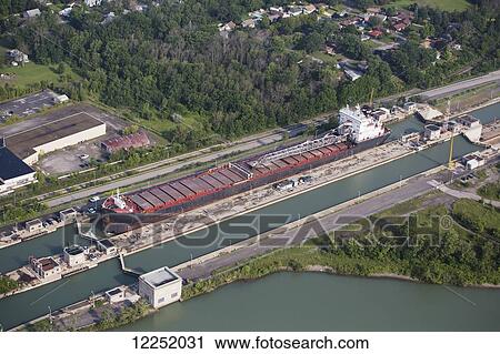 Aerial view of the Welland Canal and a ship in a canal lock; Thorold, Ontario, Canada View Large Photo Image Stock Image - Aerial view of the Welland Canal and a ship in a canal lock; Thorold, Ontario, Canada. Fotosearch