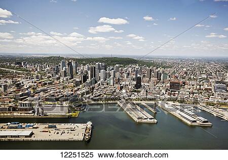 Stock Photography - Aerial view of urban skyline and port; Montreal, Quebec, Canada. Fotosearch