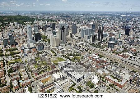 Stock Image - Aerial view of urban skyline; Montreal, Quebec, Canada. Fotosearch