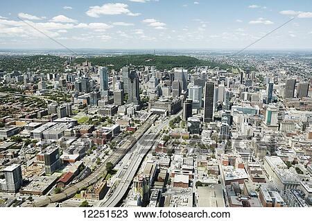 Stock Image - Aerial view of urban skyline; Montreal, Quebec, Canada. Fotosearch