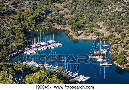 Aerial View Of Yachts Docked In The Harbor; Gocek, Mugla Province, Turkey View Large Photo Image Stock Photo - Aerial View Of Yachts Docked In The Harbor; Gocek, Mugla Province, Turkey. Fotosearch