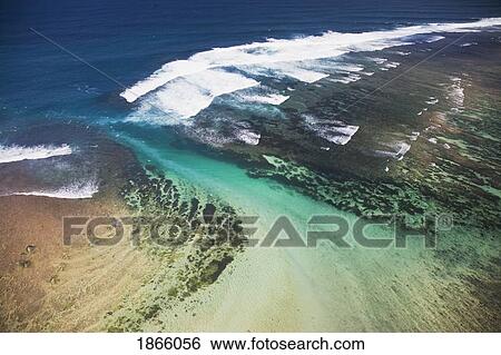 Aerial View Over The Reefs On The Southern Coast Of The Bukit Peninsula Of Bali; Bali, Indonesia View Large Photo Image Stock Photograph - Aerial View Over The Reefs On The Southern Coast Of The Bukit Peninsula Of Bali; Bali, Indonesia. Fotosearch