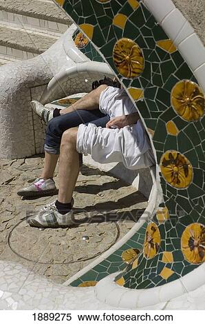 Affectionate Couple Sitting On Bench In Parc Guell View Large Photo Image Stock Photography - Affectionate Couple Sitting On Bench In Parc Guell. Fotosearch