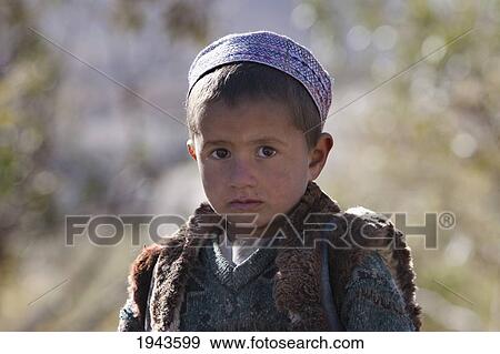Stock Photo - Afghan Boy In The Siagerd Valley, Parwan Province, Afghanistan. Fotosearch