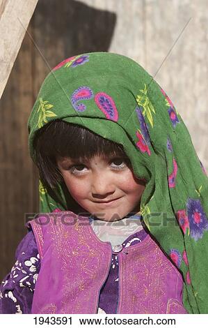 Stock Image - Afghan Girl In Shekh Ali, Parwan Province, Afghanistan. Fotosearch
