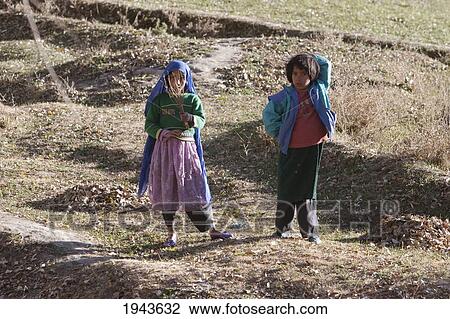 Afghan Girls In A Field Near Kharwalang, Vardak Province, Afghanistan View Large Photo Image Stock Image - Afghan Girls In A Field Near Kharwalang, Vardak Province, Afghanistan. Fotosearch