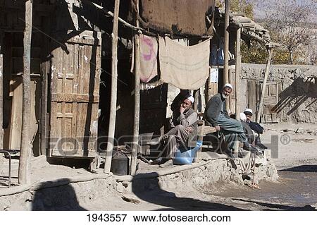 Afghan Men In A Store In Chahar Deh-Ye Ghowr Band, Parwan Province, Afghanistan View Large Photo Image Stock Photo - Afghan Men In A Store In Chahar Deh-Ye Ghowr Band, Parwan Province, Afghanistan. Fotosearch