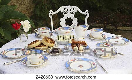 Afternoon tea in an english country garden; England View Large Photo Image Stock Photo - Afternoon tea in an english country garden; England. Fotosearch