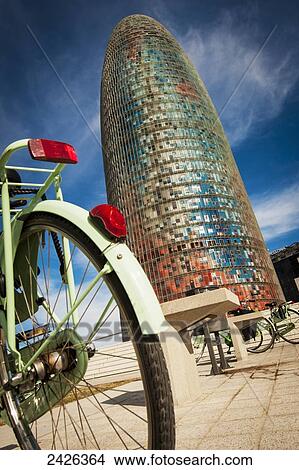 Agbar Tower in Les Glories and parked bicycles; Barcelona, Catalonia, Spain View Large Photo Image Picture - Agbar Tower in Les Glories and parked bicycles; Barcelona, Catalonia, Spain. Fotosearch