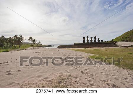Stock Image - Ahu Nau Nau Moais Restored By The Archaeologist Sergio Rapu At Anakena Beach, Rapa Nui (Easter Island), Chile. Fotosearch