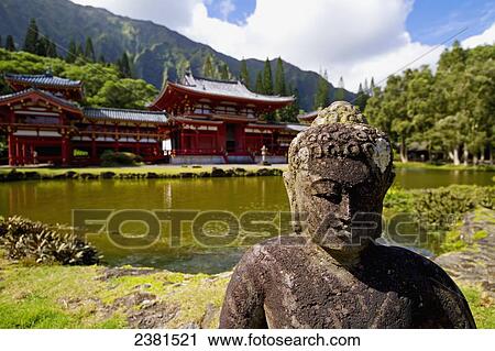 Stock Image - Ahuimanu Balley, Byodo-In Temple located in the Valley of the Temples; Oahu, Hawaii, United States of America. Fotosearch