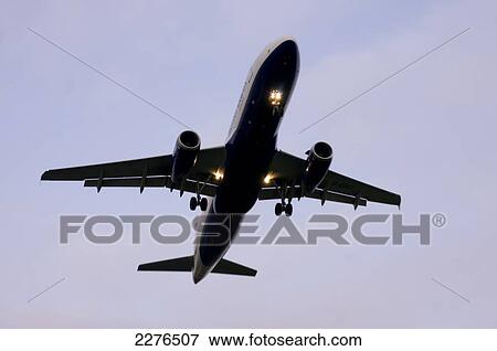 Airplane Airbus Approaching Heathrow Airbus A321-200. View Large Photo Image Stock Photo - Airplane Airbus Approaching Heathrow Airbus A321-200.. Fotosearch