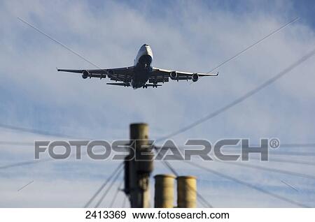 Airplane departure; England View Large Photo Image Stock Photo - Airplane departure; England. Fotosearch