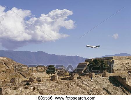 Airplane Flying Over The Ruins Of Monte Alban View Large Photo Image Stock Photograph - Airplane Flying Over The Ruins Of Monte Alban. Fotosearch