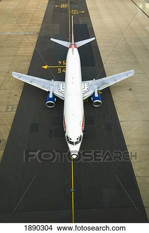 Picture - Airplane On Runway At Gatwick Airport. Fotosearch