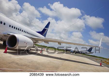 Stock Photo - Airplanes Sitting On The Tarmac; Punta Cana La Altagracia Dominican Republic. Fotosearch
