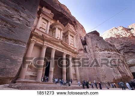 Stock Image - Al Khazneh In Petra With Visitors. Fotosearch