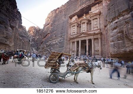 Stock Photograph - Al Khazneh In Petra With Visitors. Fotosearch