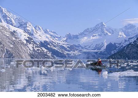 Alaska, Glacier Bay, View Of Snow Covered Mountains Boat And Ice Chunks Floating In Lake View Large Photo Image Stock Image - Alaska, Glacier Bay, View Of Snow Covered Mountains Boat And Ice Chunks Floating In Lake. Fotosearch