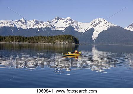 Alaska, Juneau, Favorite Passage. Kayaking Through Beautiful Mountain Ranges. View Large Photo Image Stock Image - Alaska, Juneau, Favorite Passage. Kayaking Through Beautiful Mountain Ranges.. Fotosearch