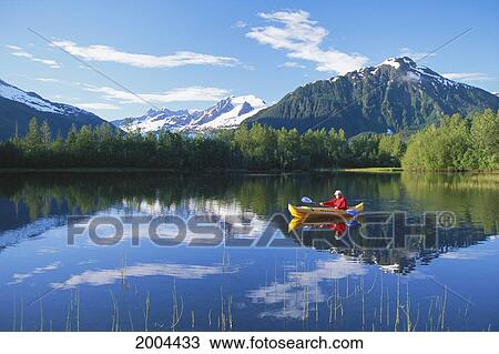 Alaska, Juneau, Inside Passage, Tongass National Forest, Man Kayaking In Yellow Kayak Near Mendenhall Glacier View Large Photo Image Stock Image - Alaska, Juneau, Inside Passage, Tongass National Forest, Man Kayaking In Yellow Kayak Near Mendenhall Glacier. Fotosearch