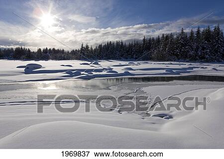 Stock Photo - Alaska, Juneau, Mendenhall Glacier, Mount Mcginnis And Mount Stroller White In Background.. Fotosearch