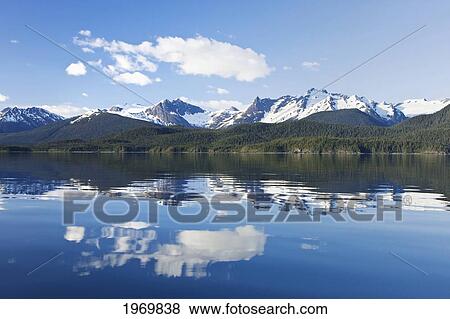 Stock Photo - Alaska, Juneau, Mendenhall Glacier, Tongass National Forest, Mountains Reflect In A Mountain Lake.. Fotosearch
