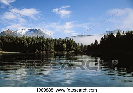 Stock Photo - Alaska, Juneau, Mendenhall Glacier, Tongass National Forest, Mountains Reflect In A Mountain Lake.. Fotosearch