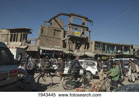 Albeit These Buildings Have Been Destroyed By Shelling The Bazaar Stores Below Are Thriving On This Kabul Street,, Afghanistan View Large Photo Image Stock Photography - Albeit These Buildings Have Been Destroyed By Shelling The Bazaar Stores Below Are Thriving On This Kabul Street,, Afghanistan. Fotosearch