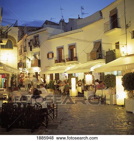 Stock Photo - Alfresco Cafes In The Old Town At Dusk. Fotosearch