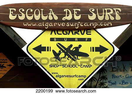 Stock Photo - Algarve, Portugal. Surf School At One Of The Many Beaches Scattered Along The Rough Atlantic Coastline Of The Western Reaches Of The Algarve.. Fotosearch