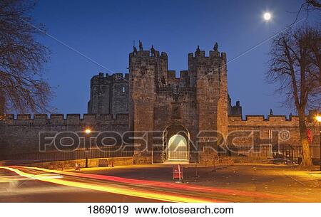 Stock Photo - Alnwick, Northumberland, England; A Guarded Entrance With Stone Walls. Fotosearch