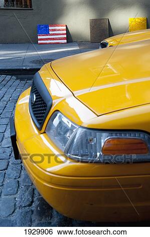 American Flag And Yellow Taxi In Manhattan, New York, Usa View Large Photo Image Stock Photograph - American Flag And Yellow Taxi In Manhattan, New York, Usa. Fotosearch