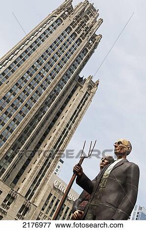Stock Photo - American Gothic Statue And The Tribune Tower; Chicago Illinois United States Of America. Fotosearch