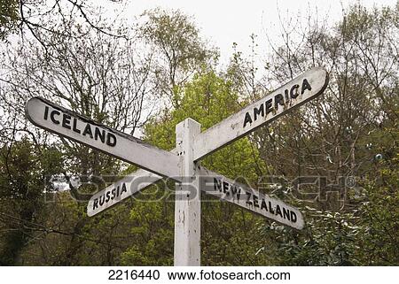 Stock Image - Amusing Direction Sign On The South West Coast Path Near Lynmouth, Exmoor, United Kingdom. Fotosearch