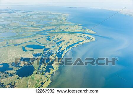 An aerial view of Hotham Inlet, the Kobuk River Delta and surrounding lakes and wetlands, Kobuk, Arctic Alaska, summer View Large Photo Image Stock Image - An aerial view of Hotham Inlet, the Kobuk River Delta and surrounding lakes and wetlands, Kobuk, Arctic Alaska, summer. Fotosearch