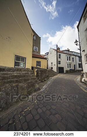 An alleyway between houses; Staithes, North Yorkshire, England View Large Photo Image Stock Image - An alleyway between houses; Staithes, North Yorkshire, England. Fotosearch