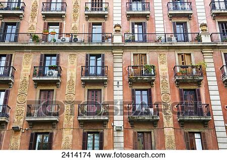 Picture - An apartment building with balconies; Barcelona, Spain. Fotosearch