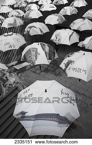 Stock Image - An Art Installation Near The City Hall With Many Umbrellas Dangling Above; Seoul, South Korea. Fotosearch
