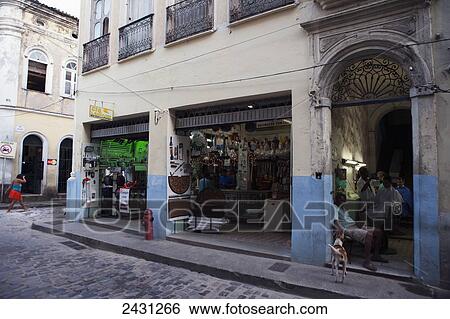 An electrical and hardware store, and barber shop in the hallway of a historic colonial building, in the Pelourinho district; Salvador, Bahia, Brazil View Large Photo Image Stock Photograph - An electrical and hardware store, and barber shop in the hallway of a historic colonial building, in the Pelourinho district; Salvador, Bahia, Brazil. Fotosearch