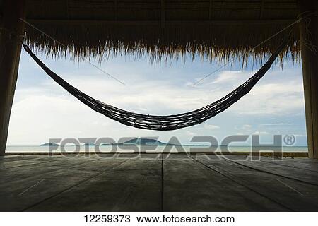 An hammock on the seaside; Kep, Cambodia View Large Photo Image Stock Image - An hammock on the seaside; Kep, Cambodia. Fotosearch