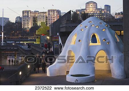 An igloo sculpture and building illuminated at dusk; London, England View Large Photo Image Stock Image - An igloo sculpture and building illuminated at dusk; London, England. Fotosearch