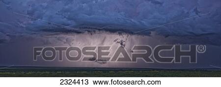 Stock Image - An intense thunderstorm races across the prairies; Val Marie, Saskatchewan, Canada. Fotosearch