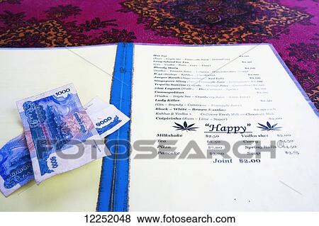 An interesting menu offering a joint for two dollars; Sihanoukville, Cambodia View Large Photo Image Stock Photo - An interesting menu offering a joint for two dollars; Sihanoukville, Cambodia. Fotosearch