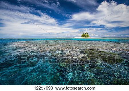 Stock Image - An island that forms part of the marine park, near the Tuvalu mainland; Tuvalu. Fotosearch