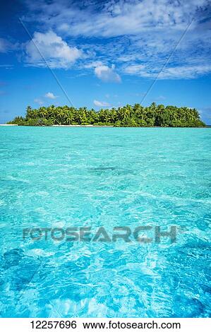 Stock Photograph - An island that forms part of the marine park, near the Tuvalu mainland; Tuvalu. Fotosearch