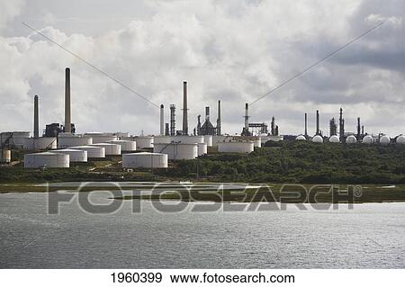 An Oil Refinery At The Water's Edge; Fawley, England View Large Photo Image Stock Photo - An Oil Refinery At The Water's Edge; Fawley, England. Fotosearch