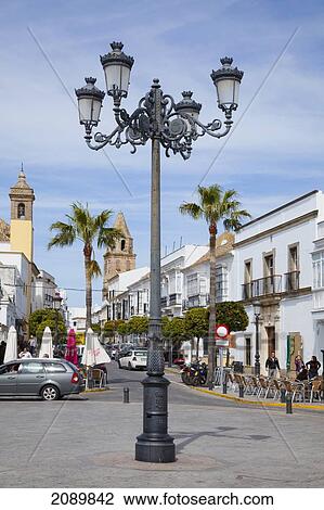 An Ornate Lampost On A Street; Medina-Sidonia, Andalusia, Spain View Large Photo Image Stock Image - An Ornate Lampost On A Street; Medina-Sidonia, Andalusia, Spain. Fotosearch