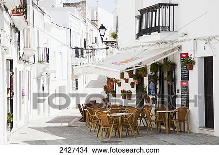 Picture - An outdoor restaurant patio and whitewash buildings; Vejer de la Frontera, Andalusia, Spain. Fotosearch